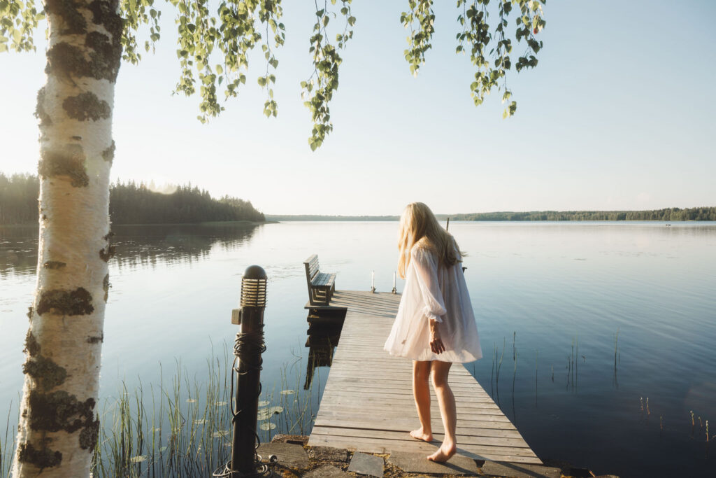 Girl on the pier during a summer day